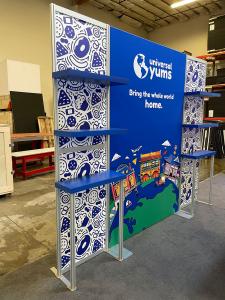 Custom Portable Modular Display with Fabric Graphics, (4) Shelves, (2) Workstations, LT-116 Counter with Locking Storage, and LED Stem Lights